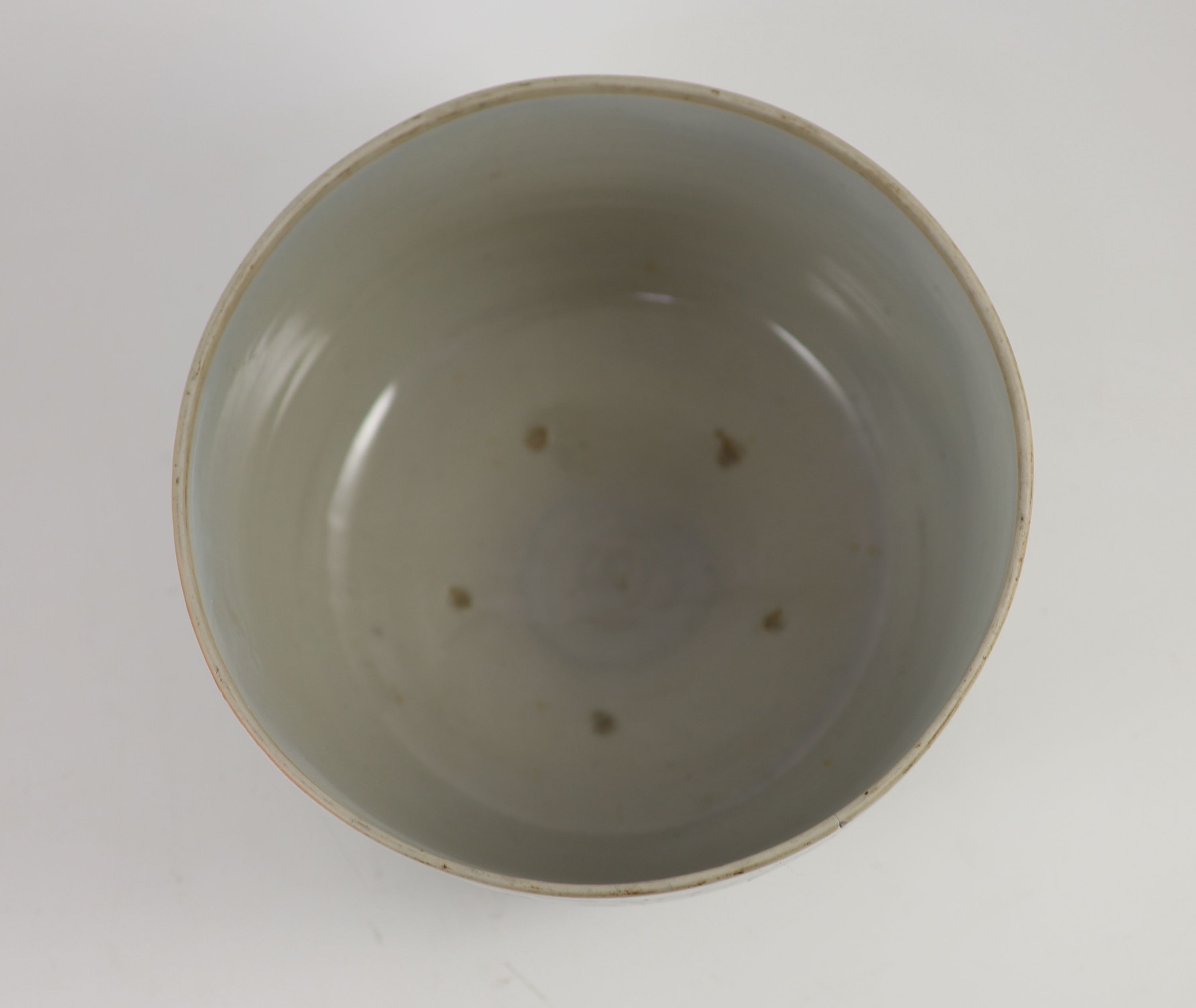 An unusual underglaze blue and iron brown bowl, probably Korean, Joseon dynasty, 18th/19th century, 23cm diameter, lacking its cover, cracked